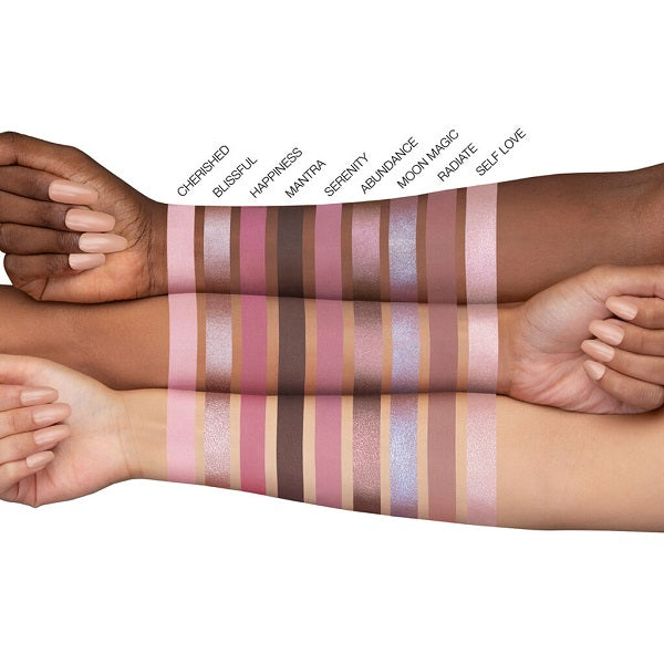 Rose quartz eyeshadow palette swatches on three skin tones, showcasing shimmery and matte shades.