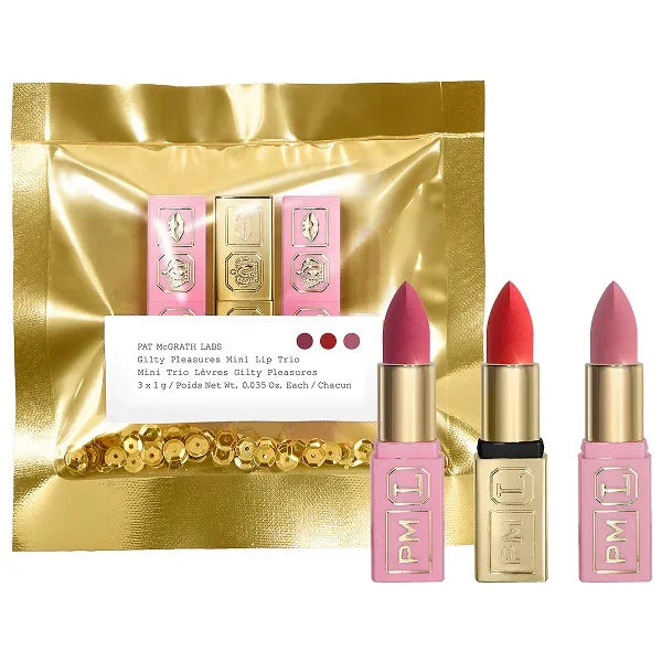 Mini lip trio set in gold packaging with three pink and gold bullet lipsticks in assorted shades