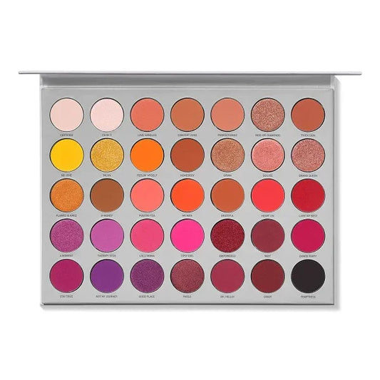 Open eyeshadow palette with 35 vibrant matte and shimmer shades in warm and bold colors