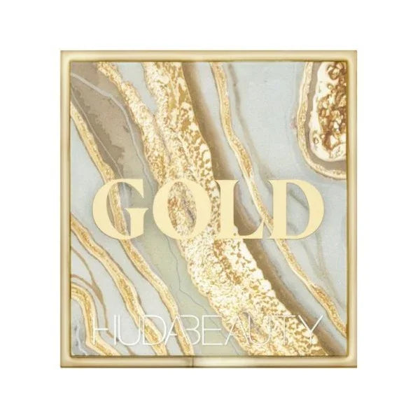 Gold eyeshadow palette with marble design and gold text on the lid