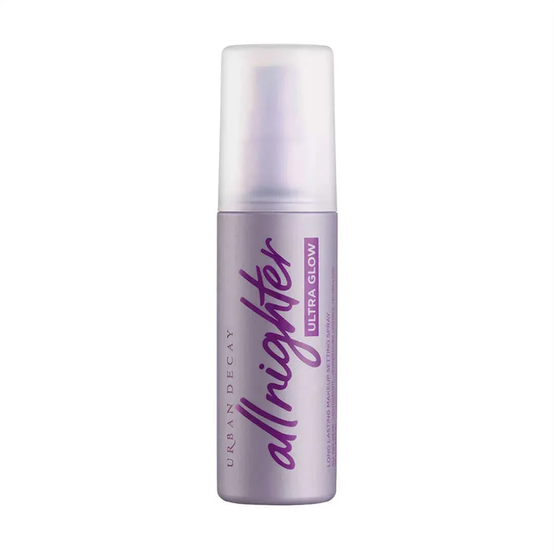 Urban Decay All Nighter Ultra Glow makeup setting spray in a purple bottle