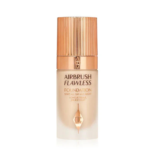 Airbrush Flawless liquid foundation bottle with gold cap on a white background