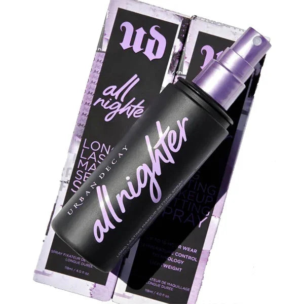 Urban Decay All Nighter makeup setting spray bottle with purple packaging.