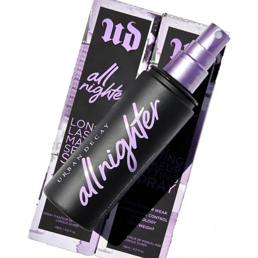 Urban Decay All Nighter makeup setting spray bottle with purple packaging.