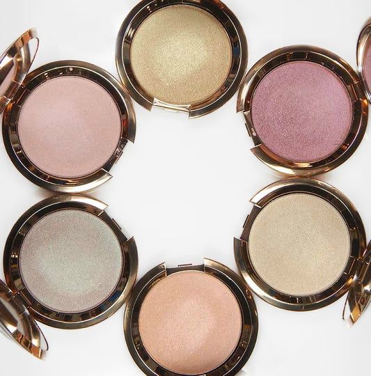 BECCA - Light Chaser Highlighter Topaz Flashes Gilt image 0