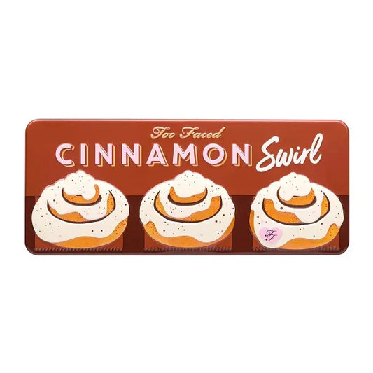 Rectangular makeup palette tin with cinnamon rolls and text 'Cinnamon Swirl' on the lid