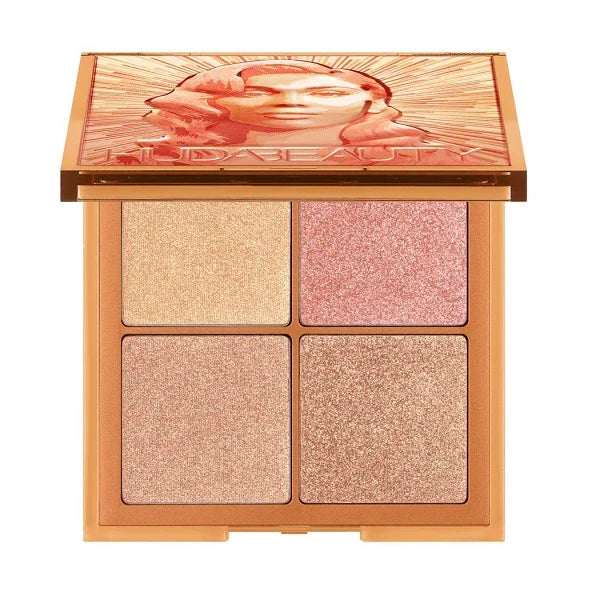 Shimmer makeup palette with four highlighter shades in a gold compact