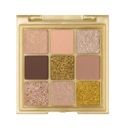 Open gold eyeshadow palette with nine shimmery and matte neutral shades.