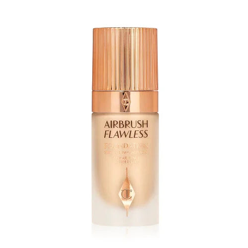 Airbrush Flawless Foundation 5 Warm bottle with gold cap on white background