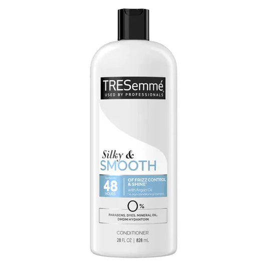 TRESemmé Silky & Smooth conditioner bottle for frizzy hair, 28 fl oz, with argan oil
