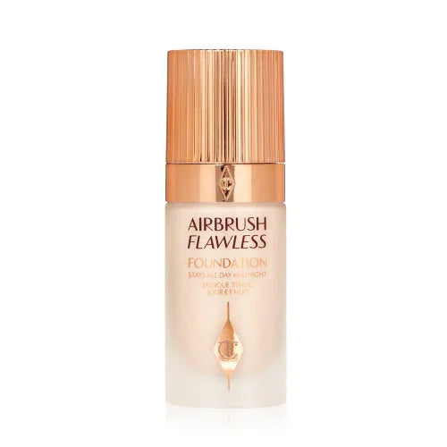 Airbrush Flawless foundation bottle with gold cap on white background