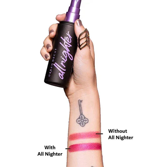 Hand holding Urban Decay All Nighter spray, showing makeup swatches with and without setting spray on arm.